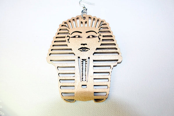 King wood dangle earrings shown in gold